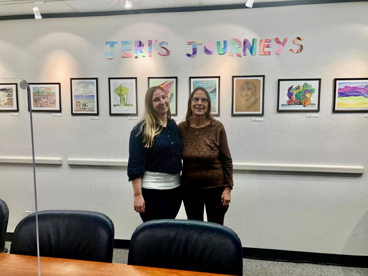 Jeri & Miranda Sulley pictured in front of Jeri's artwork 